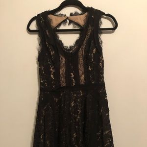 Black and cream cocktail dress with lace